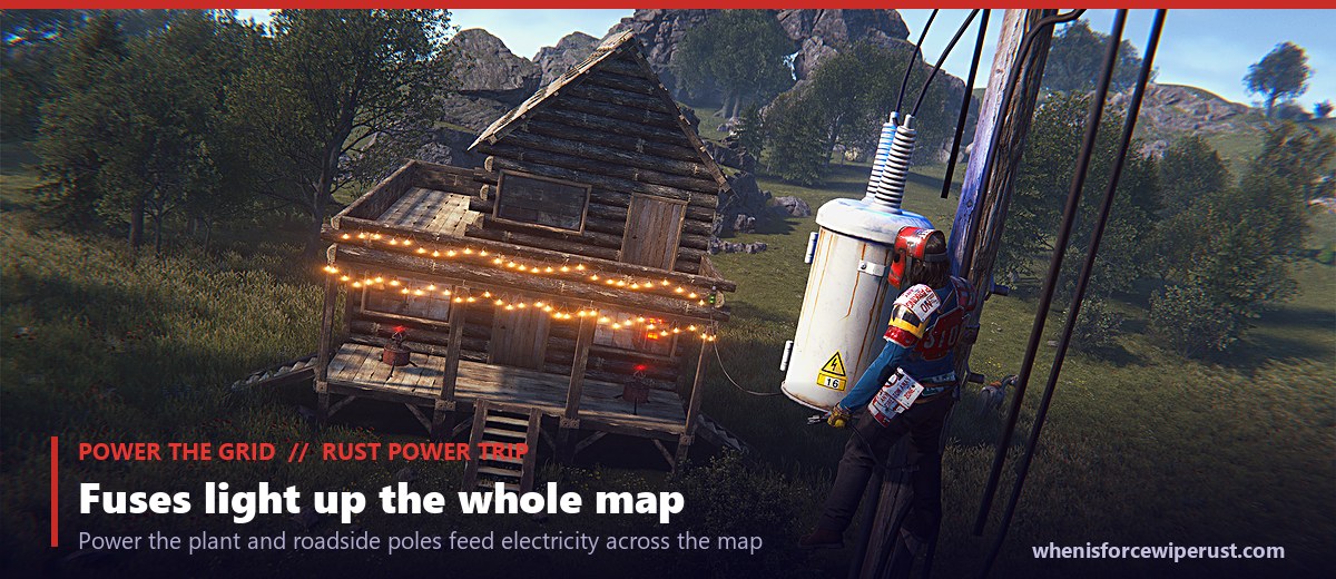 Rust roadside power line poles and transformers lit up after the Power Plant grid is powered with Heavy Fuses, from the Power Trip update, shown in game at night